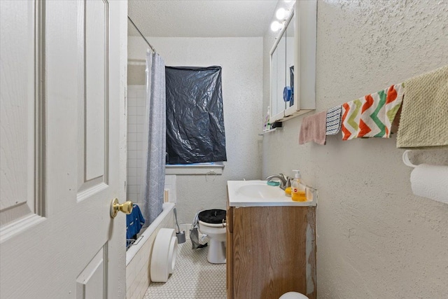 full bathroom featuring tile patterned flooring, vanity, shower / bath combination with curtain, and toilet