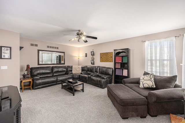 54354 Bryce Canyon Trl, Macomb, MI 48042 - living area with visible vents, carpet, and ceiling fan