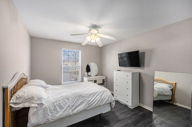 54354 Bryce Canyon Trl, Macomb, MI 48042 - bedroom featuring dark wood-type flooring, a ceiling fan, and baseboards