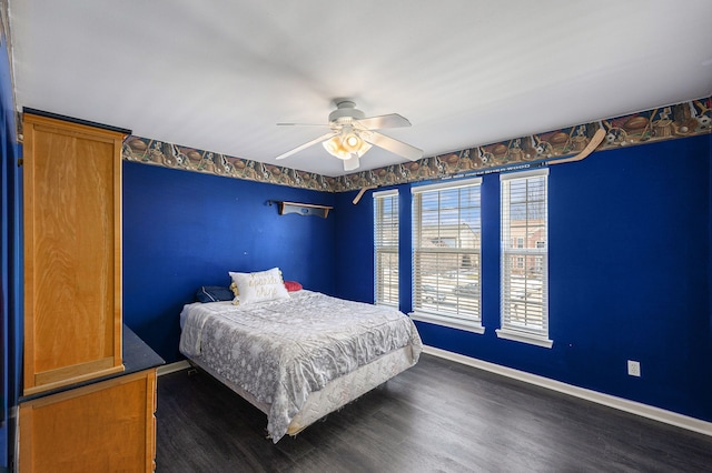 54354 Bryce Canyon Trl, Macomb, MI 48042 - bedroom featuring a ceiling fan, baseboards, and dark wood-type flooring