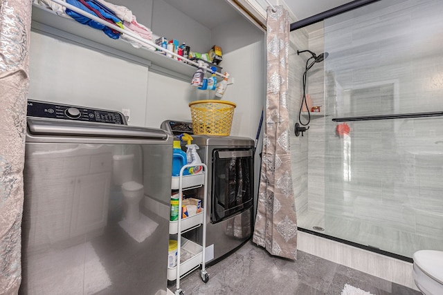 clothes washing area featuring laundry area and independent washer and dryer