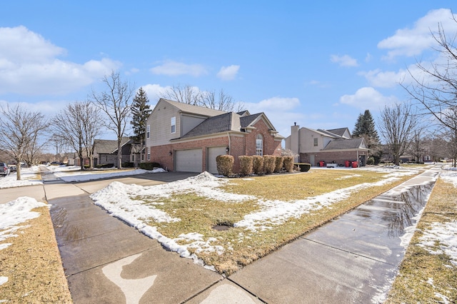 view of front of house featuring a residential view, concrete driveway, and brick siding