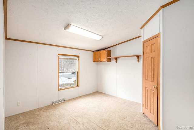 5128 Twin Lakes Dr, Kimball, MI 48074 - basement with ornamental molding, carpet, and a textured ceiling