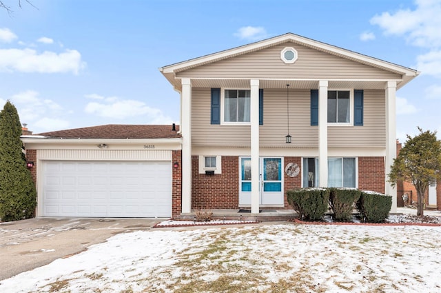 front of property with a garage