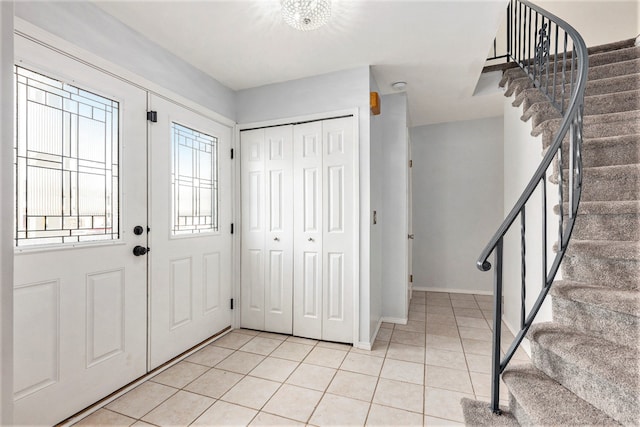 view of tiled foyer entrance