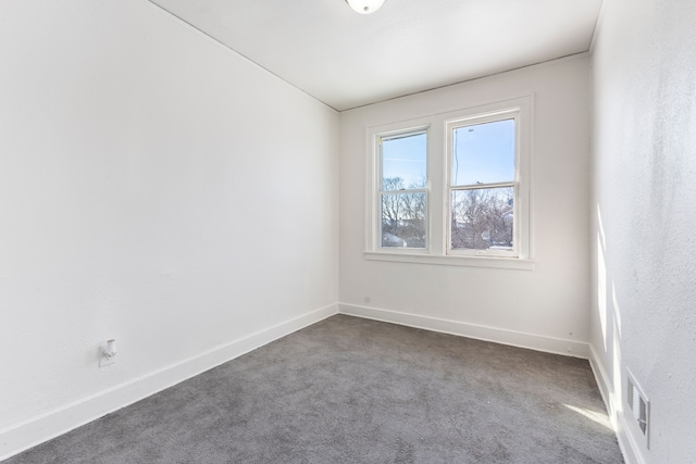 unfurnished room featuring carpet floors