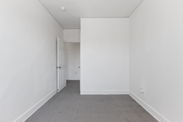 empty room with carpet floors