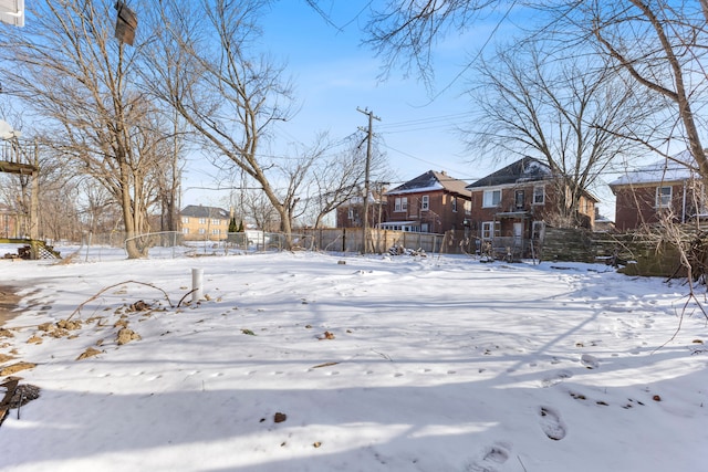 view of yard covered in snow