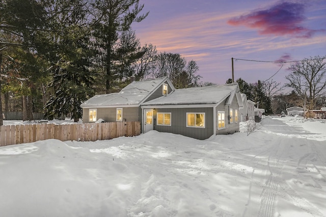 view of snow covered house