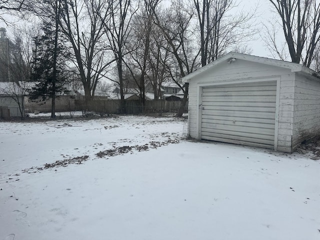 view of snow covered garage