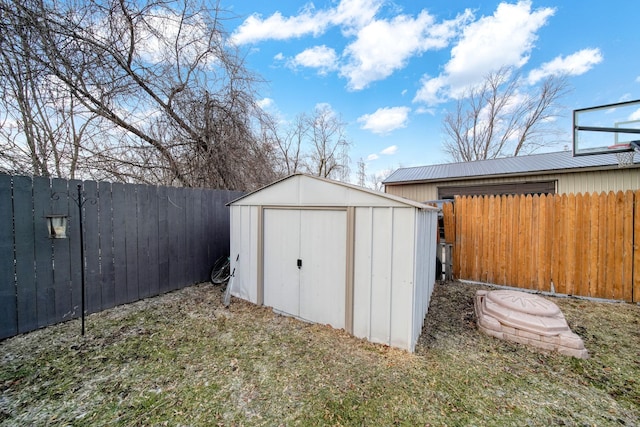 view of outdoor structure with a lawn