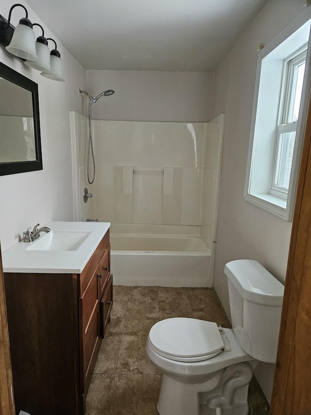445 Colfax St, Cadillac, MI 49601 - bathroom with toilet, bathing tub / shower combination, and vanity