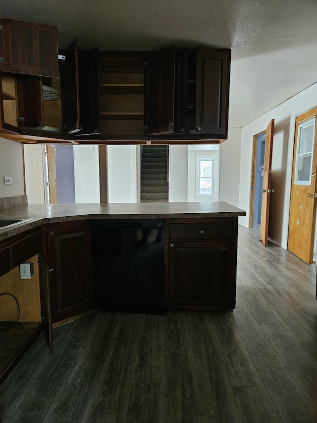 445 Colfax St, Cadillac, MI 49601 - kitchen featuring dark wood-style flooring, black dishwasher, open shelves, and dark brown cabinetry