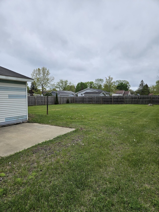 445 Colfax St, Cadillac, MI 49601 - view of yard with a patio