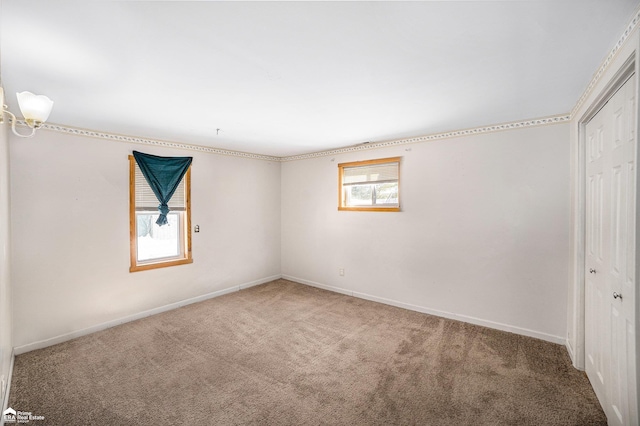 spare room with carpet flooring