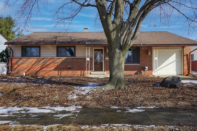 single story home featuring a garage