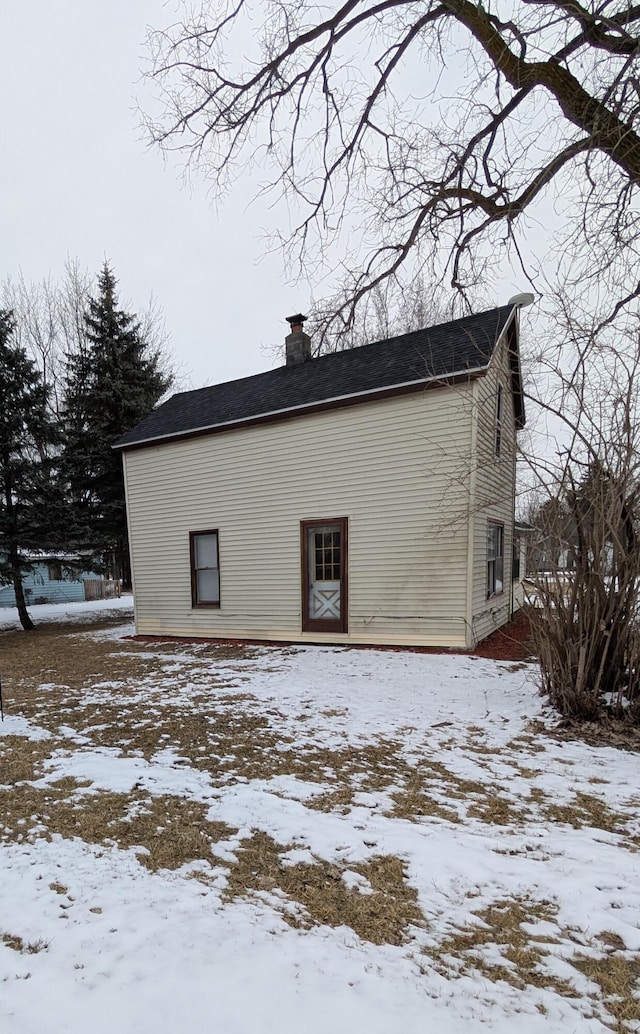 view of snow covered property