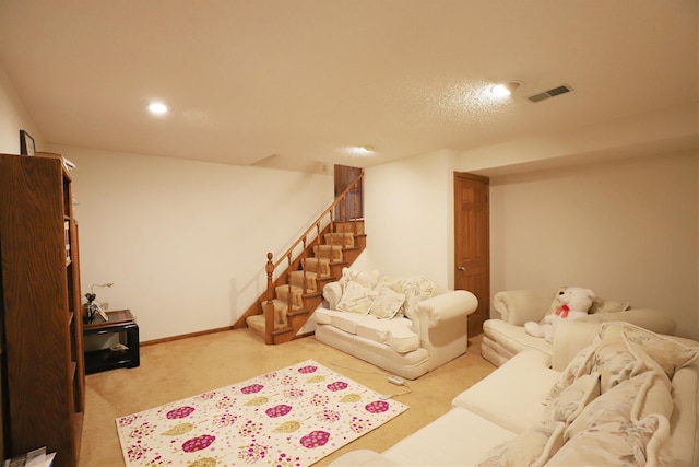 living room featuring recessed lighting, light colored carpet, visible vents, baseboards, and stairs