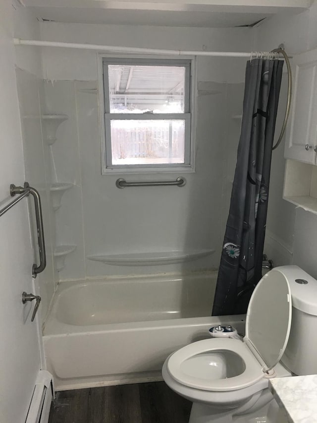 full bathroom featuring hardwood / wood-style floors, a baseboard radiator, toilet, and shower / bath combo with shower curtain