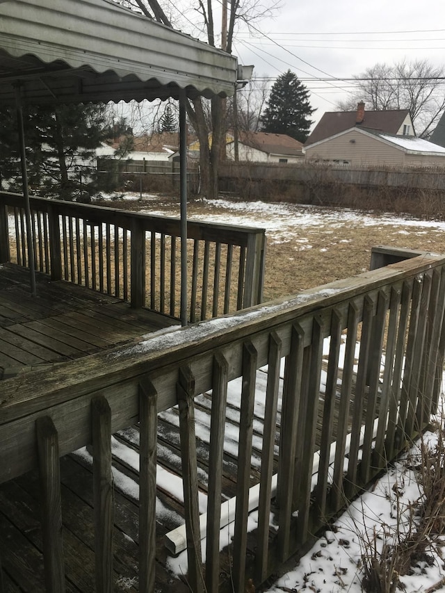 view of snow covered deck