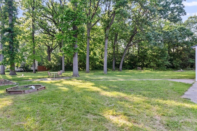 1408 Stephens Ave, Flint, MI 48507 - view of green lawn featuring a vegetable garden