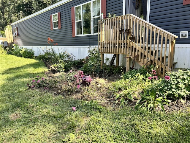 view of home's exterior with a lawn