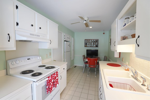 kitchen with light tile patterned flooring, white cabinetry, sink, ceiling fan, and white appliances