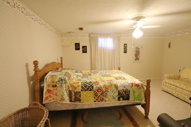 bedroom with ceiling fan and carpet flooring