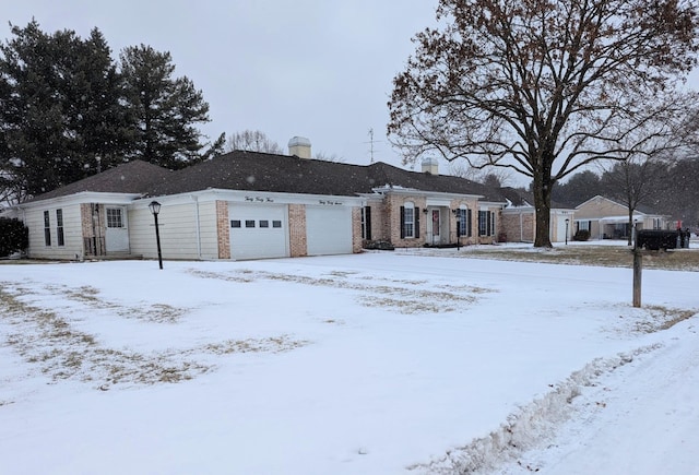 ranch-style house featuring a garage