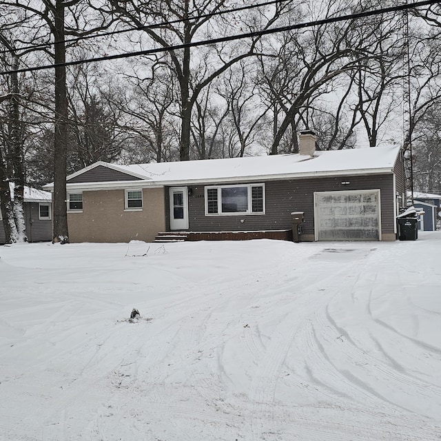 ranch-style house with a garage