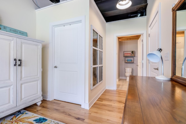 hallway featuring light hardwood / wood-style flooring