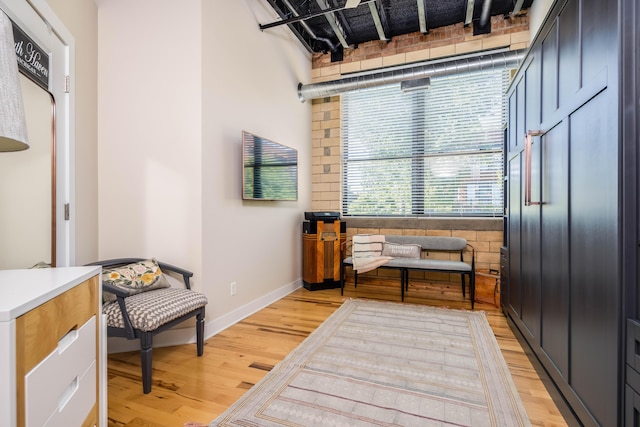 living area with light hardwood / wood-style floors