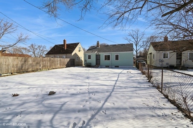 view of snow covered property