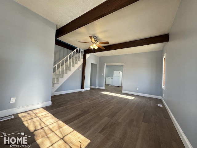 unfurnished living room featuring beam ceiling, ceiling fan, a textured ceiling, and dark hardwood / wood-style flooring