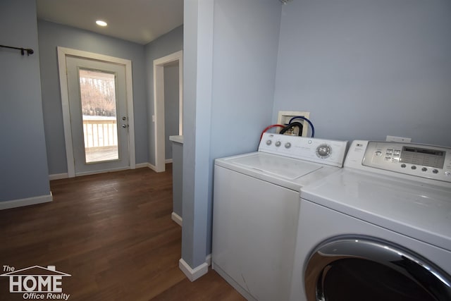 laundry area with independent washer and dryer and dark hardwood / wood-style flooring