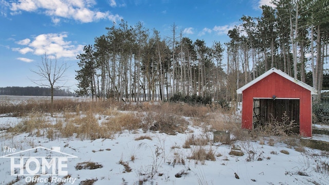 view of yard covered in snow