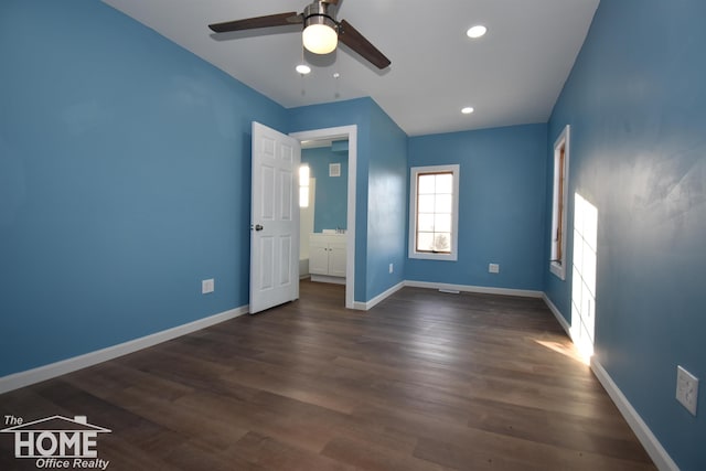 unfurnished bedroom with dark wood-type flooring