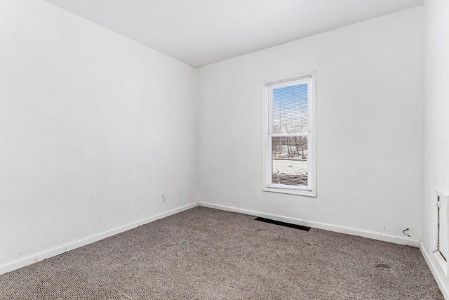 view of carpeted spare room