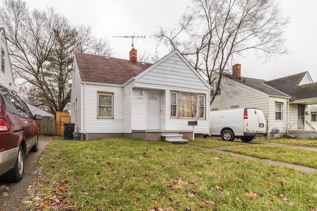 view of front of property with a front yard