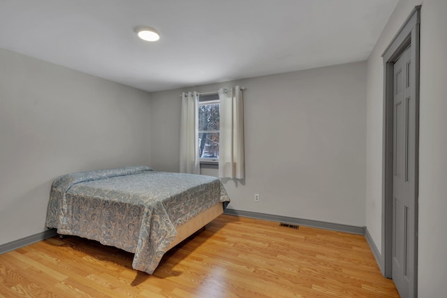 bedroom featuring hardwood / wood-style flooring