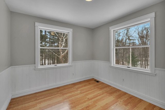 empty room featuring light hardwood / wood-style floors