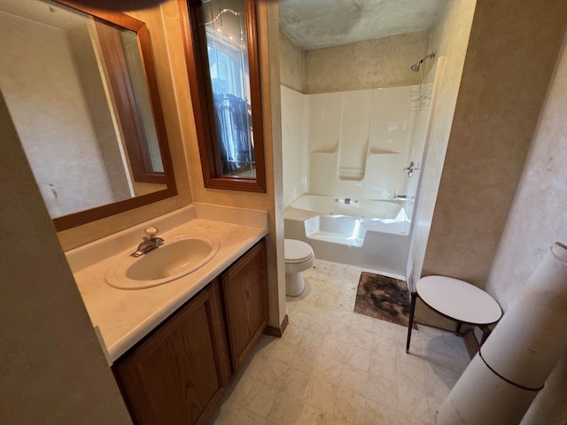 full bath featuring tile patterned floors, shower / tub combination, toilet, and vanity