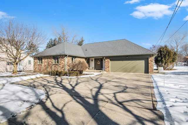 single story home featuring a garage