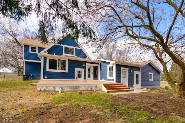 6735 S Scottdale Rd, Berrien Springs, MI 49103 - rear view of property featuring french doors, central AC, and a deck