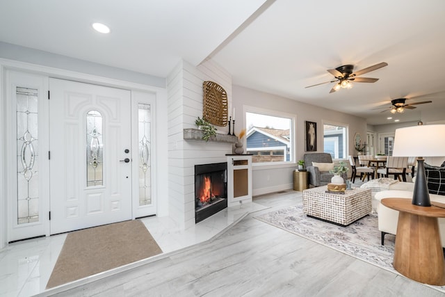 6735 S Scottdale Rd, Berrien Springs, MI 49103 - foyer featuring recessed lighting, a fireplace, and baseboards