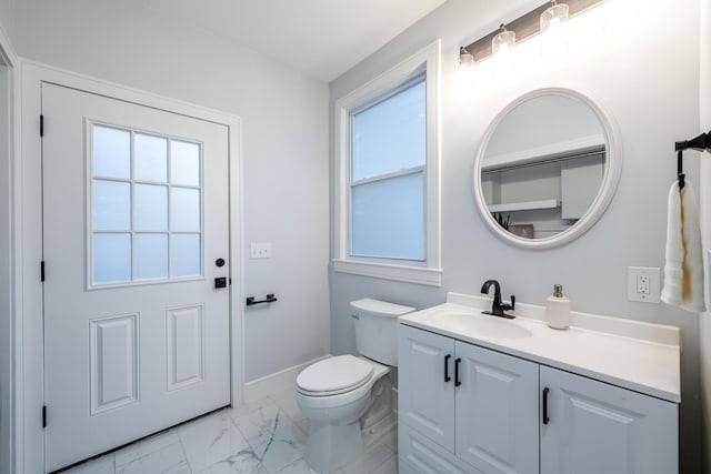 6735 S Scottdale Rd, Berrien Springs, MI 49103 - bathroom featuring marble finish floor, a healthy amount of sunlight, vanity, and toilet