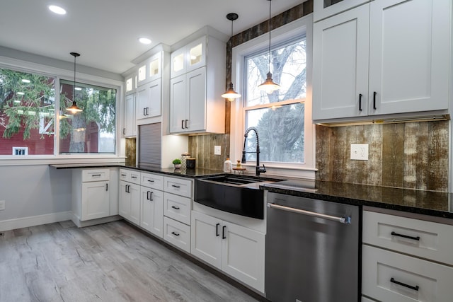 6735 S Scottdale Rd, Berrien Springs, MI 49103 - kitchen featuring baseboards, dishwasher, glass insert cabinets, white cabinetry, and a sink