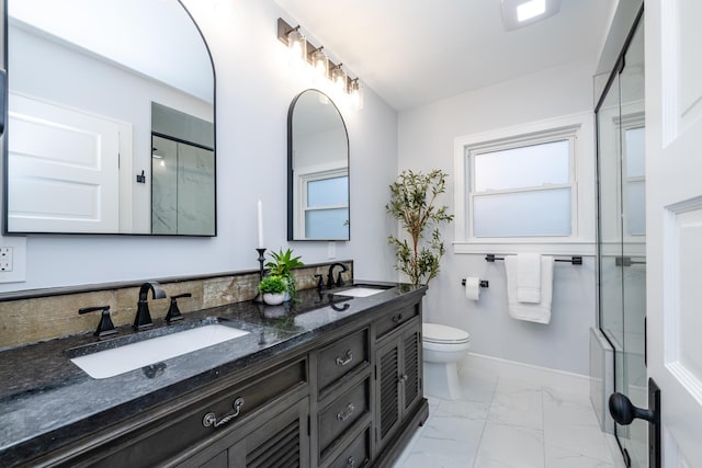 6735 S Scottdale Rd, Berrien Springs, MI 49103 - full bathroom with marble finish floor, a shower with door, a sink, and baseboards