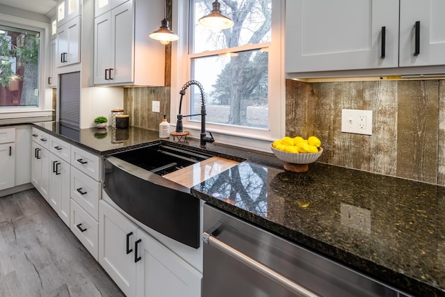 6735 S Scottdale Rd, Berrien Springs, MI 49103 - kitchen with glass insert cabinets, decorative backsplash, and a wealth of natural light