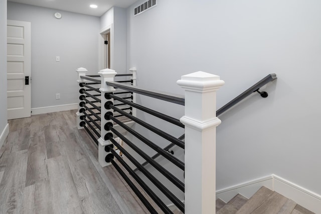 6735 S Scottdale Rd, Berrien Springs, MI 49103 - stairs featuring recessed lighting, wood finished floors, visible vents, and baseboards